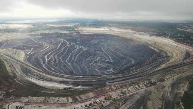 4k footage of a drone flying over an iron ore mine