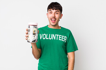 hispanic volunteer looking happy and pleasantly surprised. donations concept