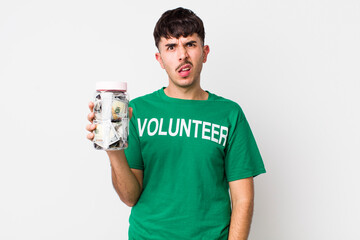 hispanic volunteer feeling puzzled and confused. donations concept
