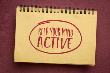 keep your mind active, inspirational handwriting in a notebook, personal development and mental health concept