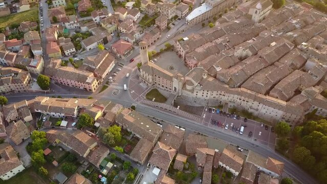 Drone shot of an old historical city during a sunset.