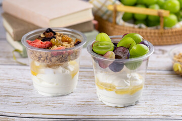Bowl of fresh natural homemade yogurt with cereal served for good health.