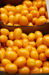 buying tomatoes at the market