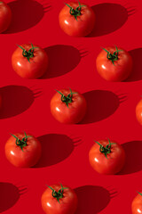 Tomatoes pattern on a red background 