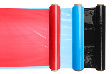 Rolls of colorful plastic stretch wrap on white background