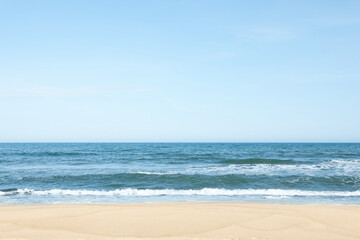 Fototapeta premium Picturesque view of beautiful sea and sandy beach on sunny day