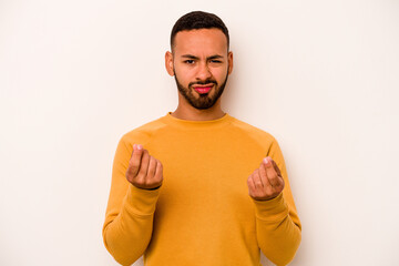 Young hispanic man isolated on white background showing that she has no money.