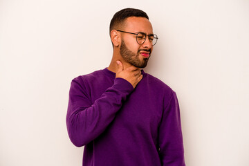 Young hispanic man isolated on white background suffers pain in throat due a virus or infection.