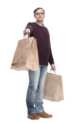 full-length. casual man with shopping bags. isolated on a white