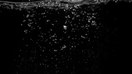 Obraz na płótnie Canvas Water bubbles floating on black background with oil paint effect which represent refreshing of refreshment from soda or carbonated drink and power of liquid that splashing by air pump.