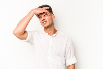 Young caucasian man isolated on white background touching temples and having headache.