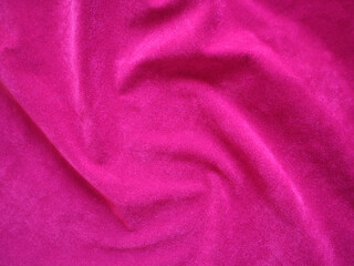 Fototapeta na wymiar Pink velvet fabric texture used as background. Empty pink fabric background of soft and smooth textile material. There is space for text.