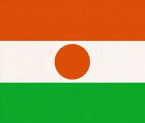Flag of Niger. Fabric Texture. National symbol.