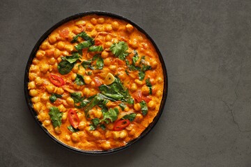 Spicy Chickpea and Spinach Curry. African chickpea stew. Flat layot