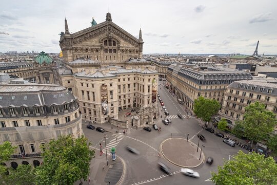 View of the gray roof, attic of Paris and Grand Opera from the roof of the shopping center Gallery Lafoyet in Paris, France