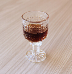 One crystal cup with red wine
