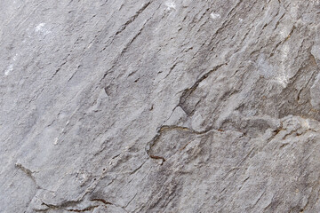 Gray background of old basalt stone, rocks