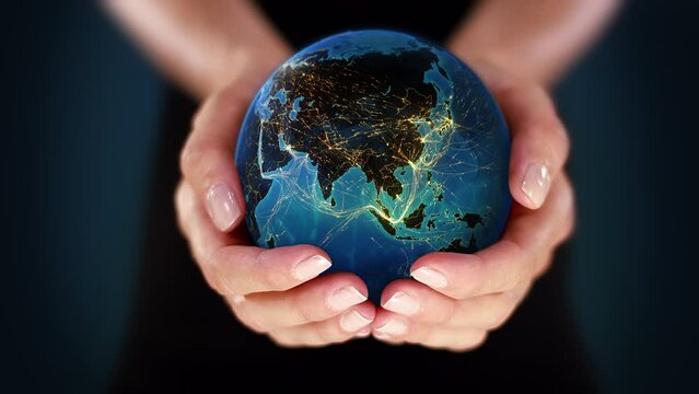 Female Hands Holding a  3D  Spinning Earth with Technological Connections. Asia, Europe and America. Telecommunication and Environmental concept. Hyperconnected World. 