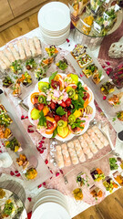 festive table decoration with various dishes at the event