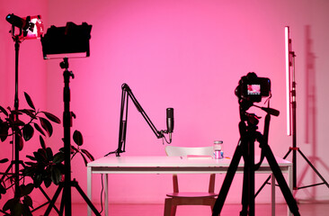 Horizontal no people interior shot of modern influencers studio equipped with camera, microphone...
