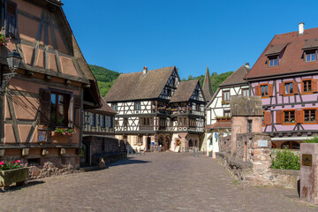 Fototapeta na wymiar historic colorful half-timbered houses and village square in the Alsatian town of Kaysersberg