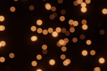Defocused bokeh lights on black background, an abstract naturally blurred backdrop for Christmas eve or birthday party. Festive light texture. Yellow and red garland in blur. Overlay effect for design