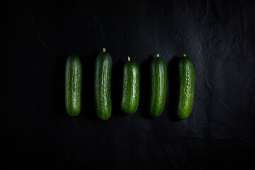 pickles on black background