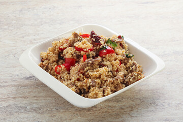 Arabic cous cous with meat and tomato