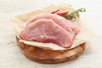 Raw pork schnitzel for roast