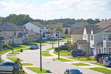 Residential neighborhood with new home construction near Winter Garden in Orlando, Florida.  - obrazy, fototapety, plakaty