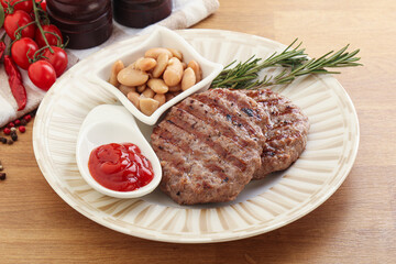Grilled beef burger cutlet with sauce