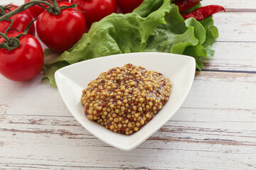 Mustard seeds sauce in the bowl