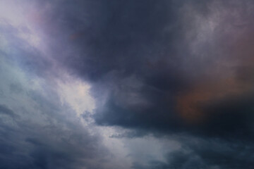 picturesque, dramatic stormy sky with dark clouds, approaching thunderstorm. Concept on theme of Severe Weather, natural disasters, hurricane, typhoon, tornado, storm, natural basis for designer