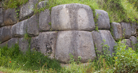 Rounded corner of inca masonry at qenqo Cusco Peru - obrazy, fototapety, plakaty