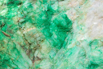 Background from dracocene crystals of stones. Fluorite stone in the rocks of the adit. Mineral stones in their natural environment. Semiprecious stones texture.