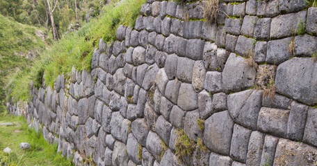 large stone masonry wall at qenqo, sacsayhuaman archaeological site, cusco Peru