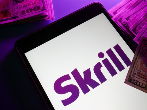 KYIV, UKRAINE - May 4, 2022. Skrill logo International money transfers.