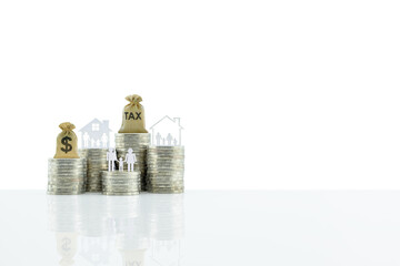 Tax benefit / residential property or estate tax concept : Tax bag, US dollar bag, a family with...
