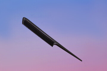 Naklejka premium Professional tools from a beauty salon on a pink blurred background