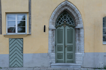 Fototapeta na wymiar Historic House entrances in the city center of Tallinn, Estonia. Copy Space for Text and Graphics