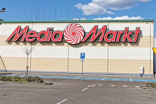 Media Markt Sign with Big Letter M in Front of a Store Editorial Image -  Image of center, concept: 209721785