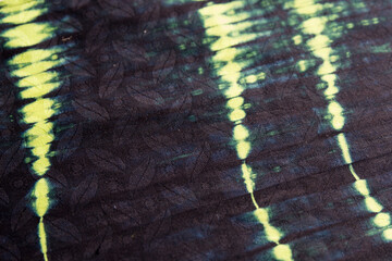 Background with dye effect. Batik