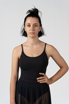 Ivry-Sur-Seine, France - 04 11 2022: studio photo. Studio shot of a young woman dancer with black body dancing