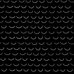 Abstract black texture with a pattern of repeating white arcs