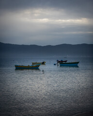 boats on the sea at sunset