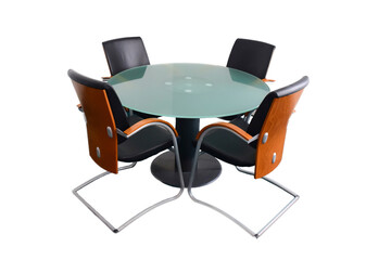 Four empty leather decorative office chairs sit around a glass round table. On a white background