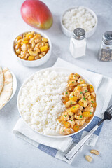 Mango Teriyaki chicken with rice in a plate