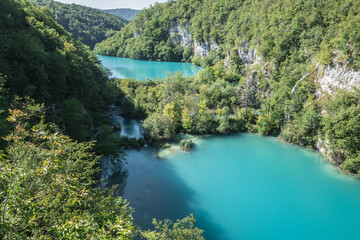 Fototapeta na wymiar Plitvice Lakes in Croatia with beautiful waterfall and blue water