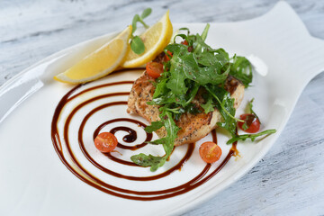 grilled fish with lemon, grilled meat
