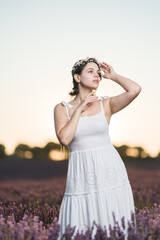 Summer lavender field nature. happy Young hispanic woman in purple flowers meadow landscape